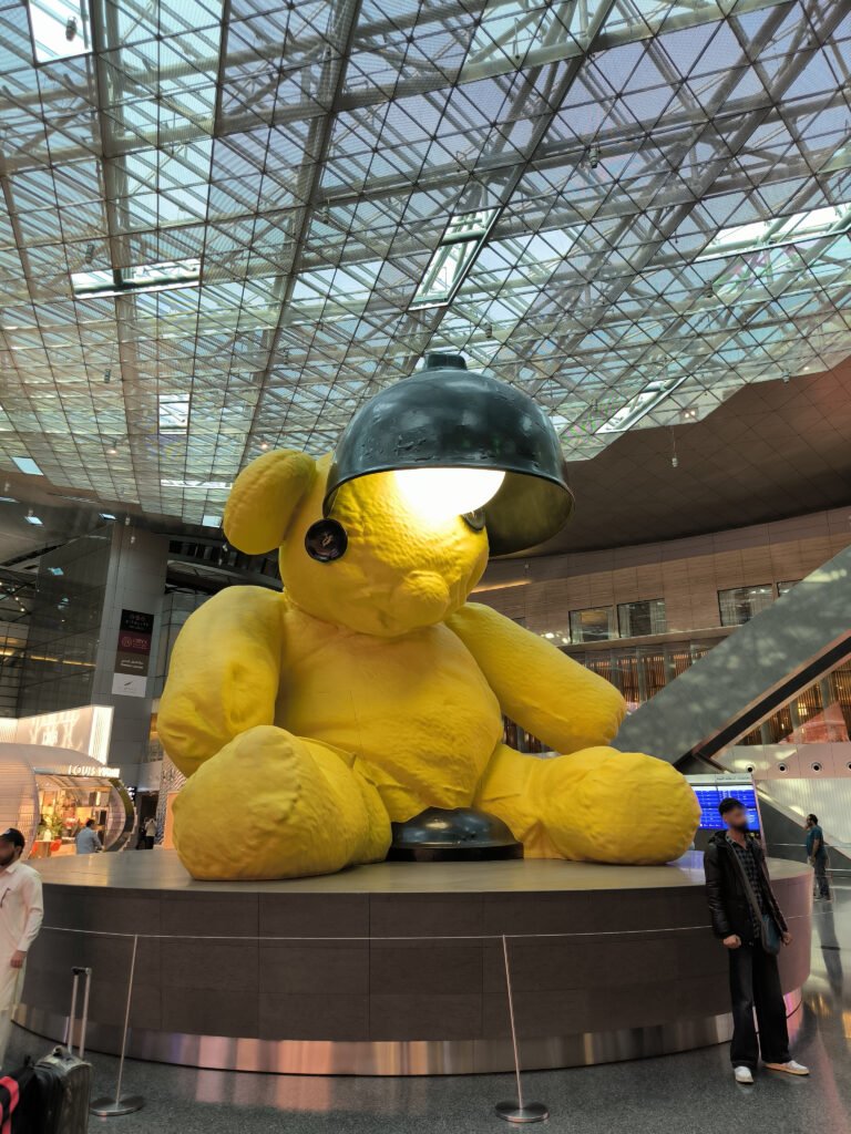 Lamp Bear, a large statue of a yellow bear located at Hamad International Airport.