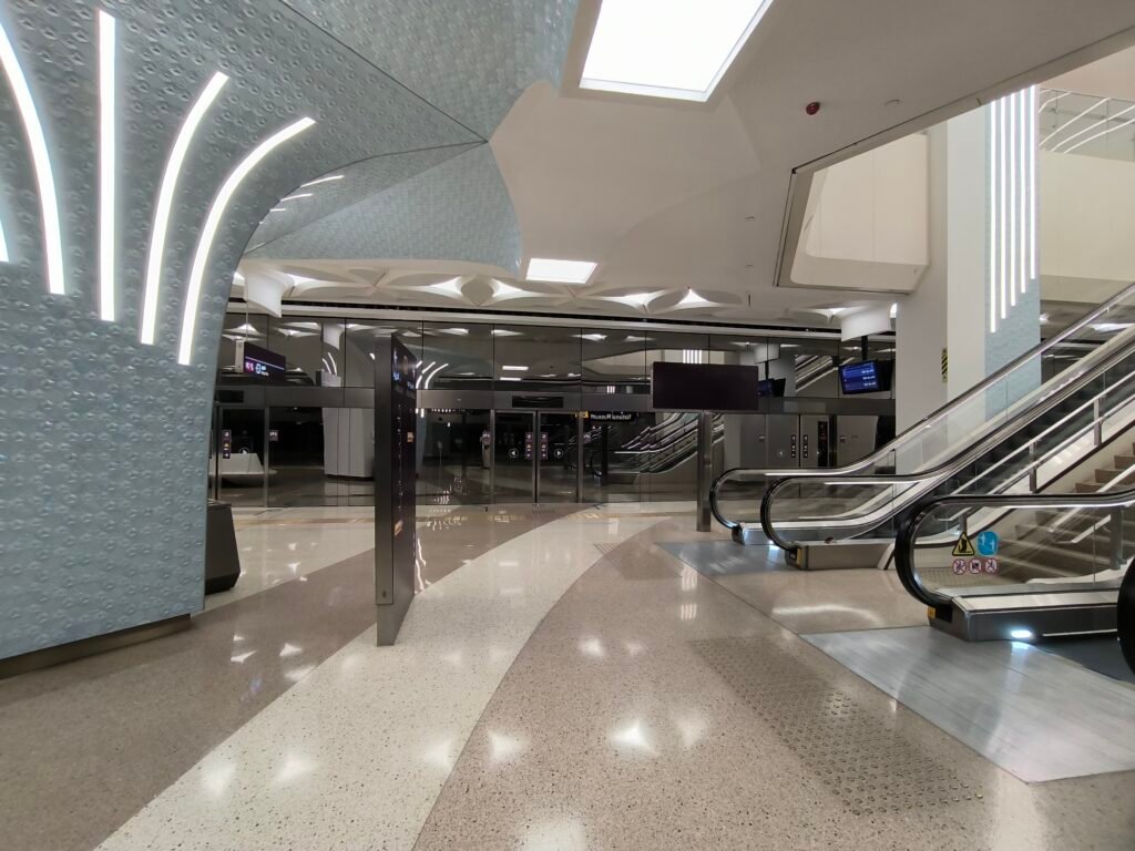 The modern, bright and clean interior of a metro station in Doha, Qatar.